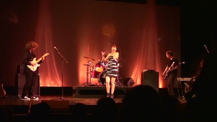 Emily Spiller performing live with her band