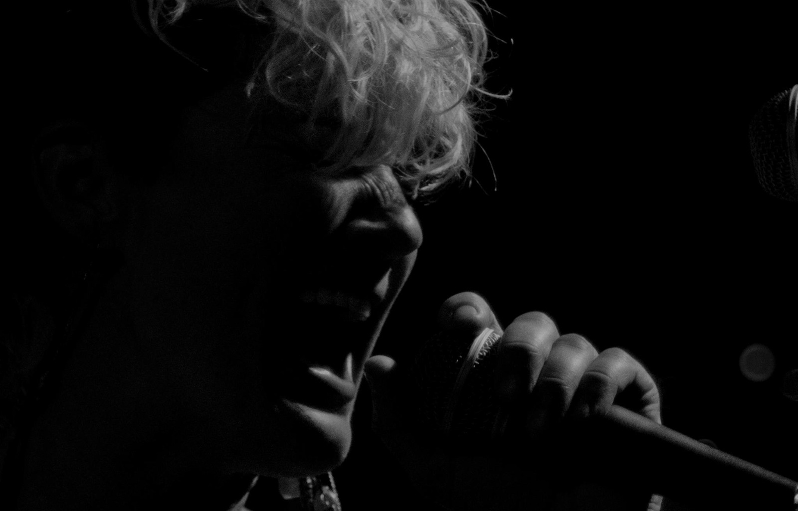 Emily Spiller performing passionately