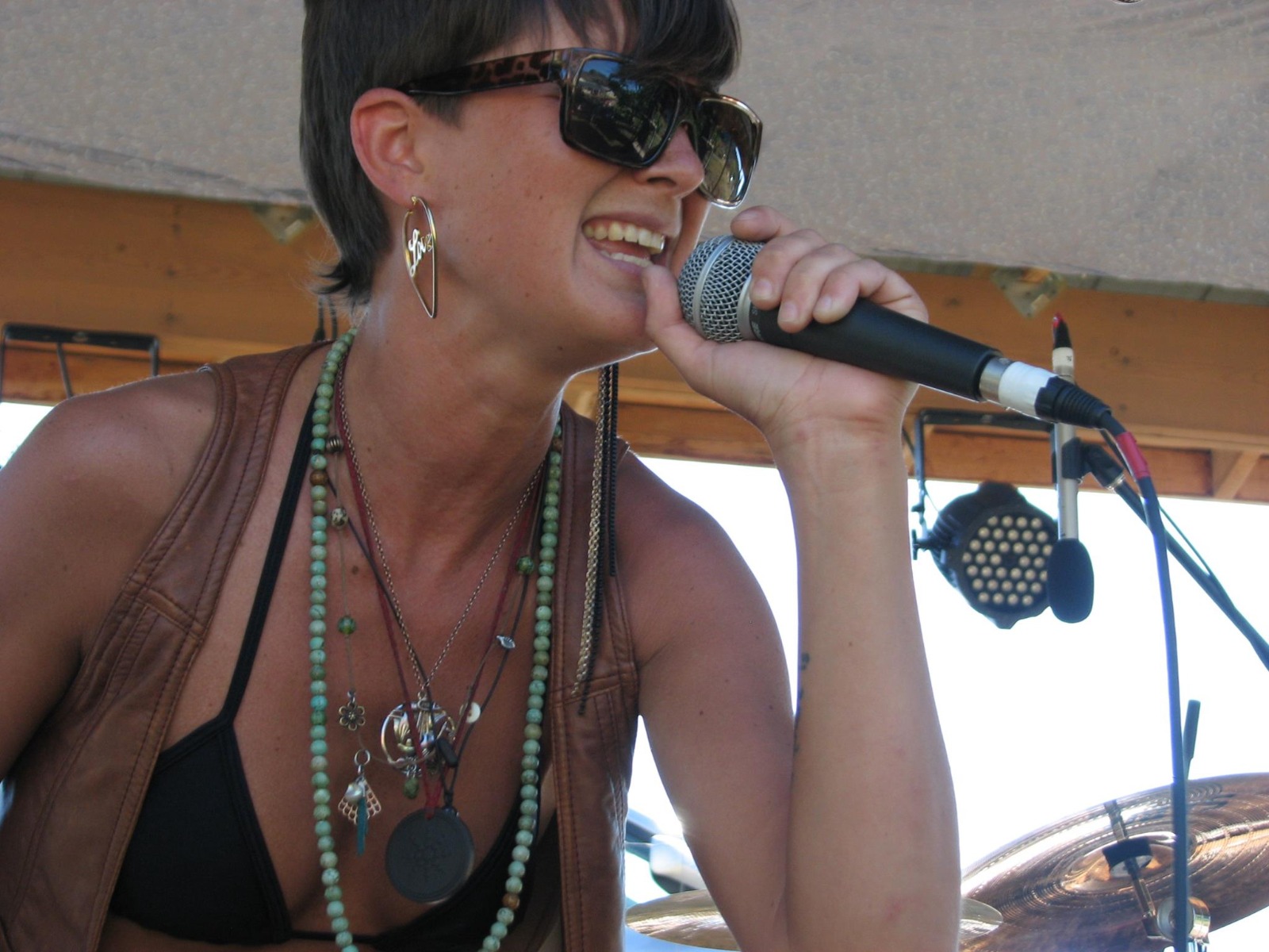 Emily Spiller performing live with sunglasses
